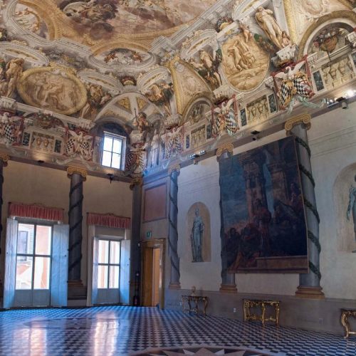 Foto ritraente il salone di Palazzo dei Pepoli di Bologna